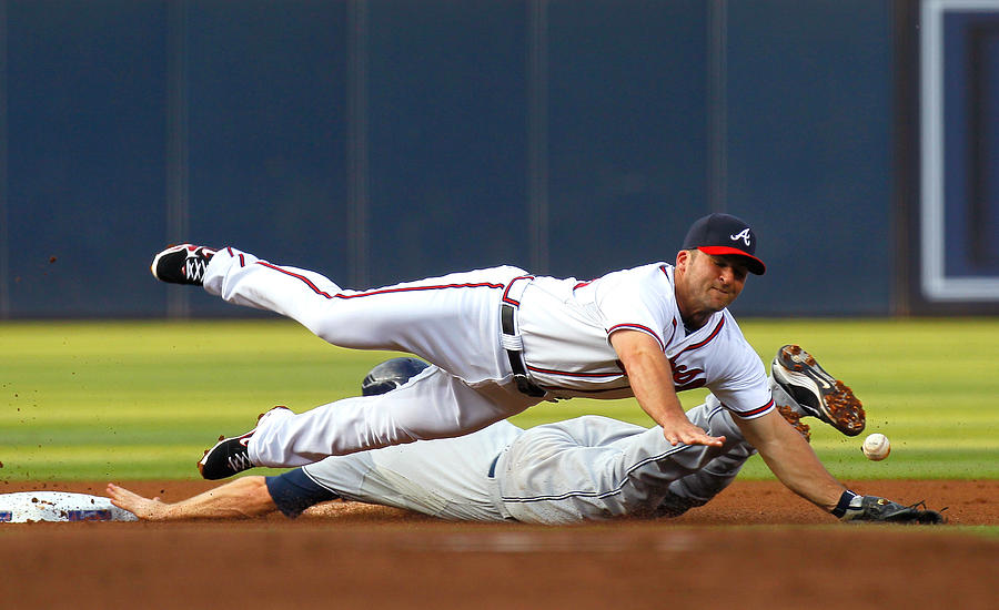 Dan Uggla and Chase Headley Photograph by Kevin C. Cox