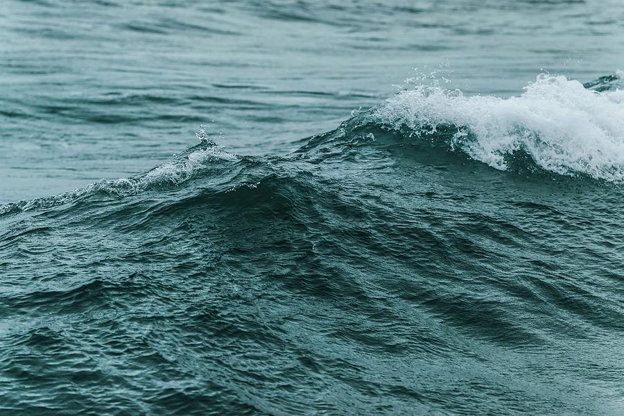 dark-blue-green-sea-waves-with-white-foam-in-close-up-background-with