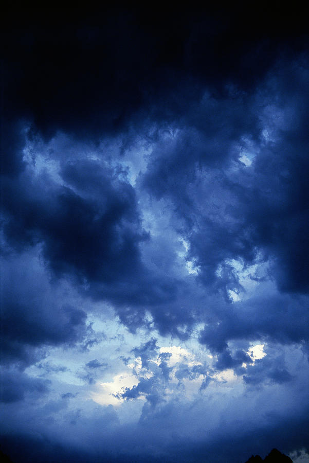 Dark Clouds Photograph by Chuck Plante
