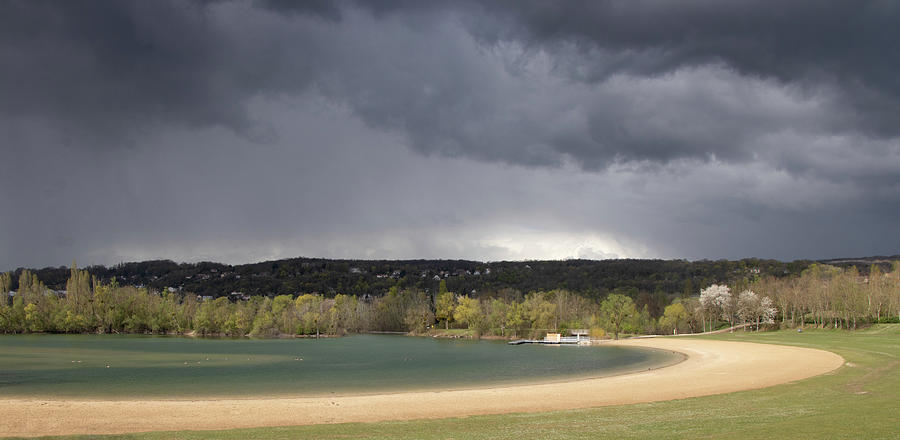 Dark clouds over the beach Photograph by Avenue Des Images Dark clouds over the beach Photograph by Avenue Des Images