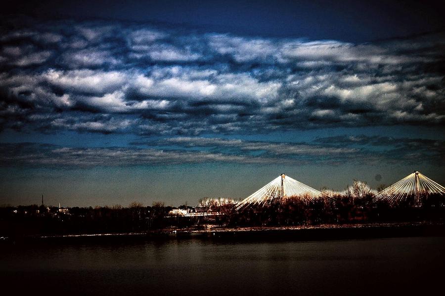 Dark clouds over the Mississippi River  Photograph by James Inlow