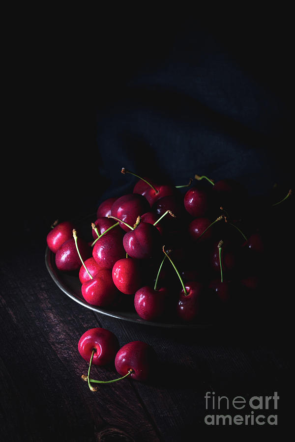   Dark red cherries on a pewter plate Photograph by Jane Rix