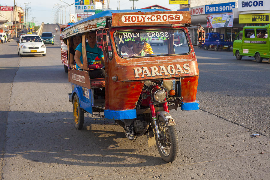 Davao, Philippines: "Tricycle" made up of a motorcycle with carriage Photograph by Holgs
