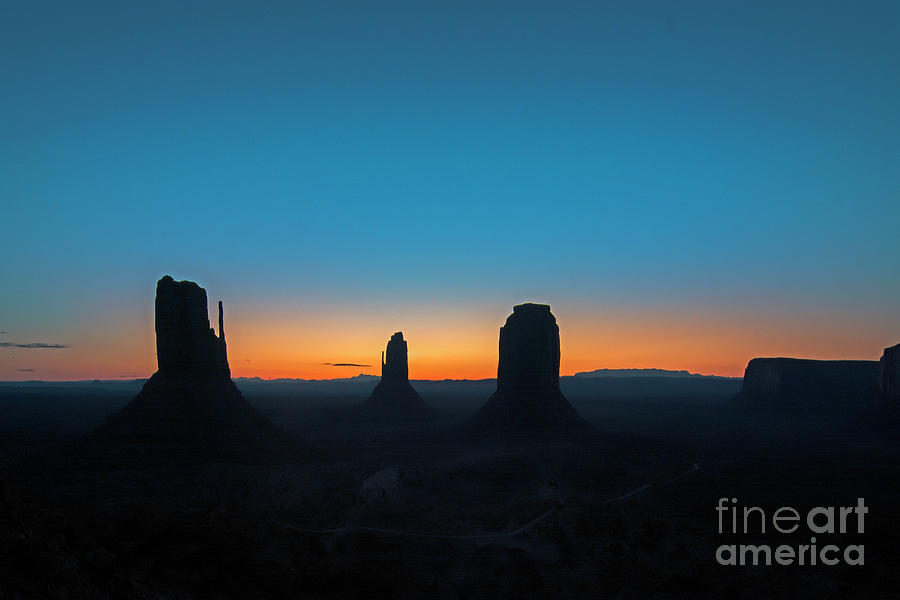 Dawn in Monument Valley Photograph by John Bartelt