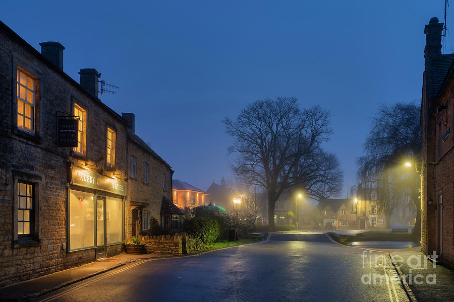 Dawn Mist in Bourton on the Water Photograph by Tim Gainey