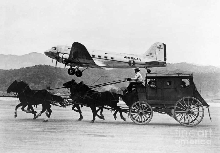 DC-3 AIRPLANE AND STAGECOACH, c1947 Photograph by Granger