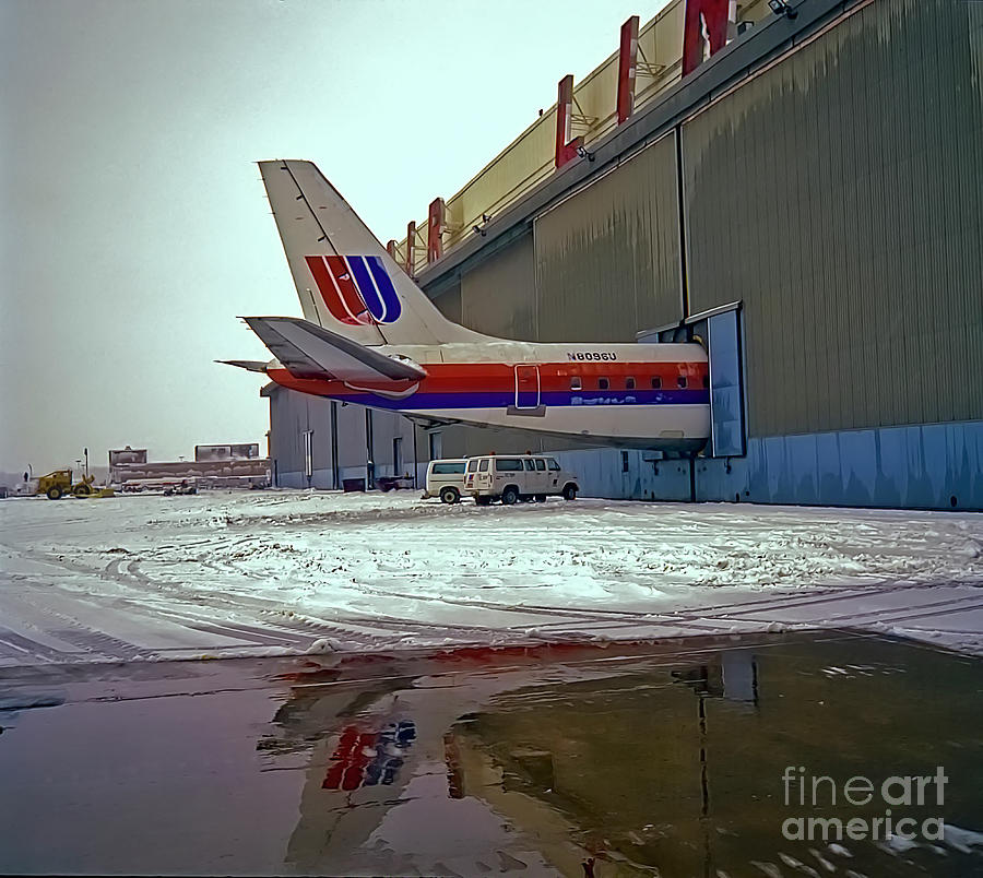 Dc 8 Hangar Doors Shut, Snow  Photograph by Tom Jelen