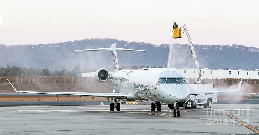 De-icing American Airlines Jet at Asheville Regional Airport Photograph by David Oppenheimer