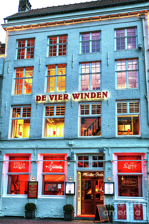 De Vier Winden at Night in Bruges Photograph by John Rizzuto