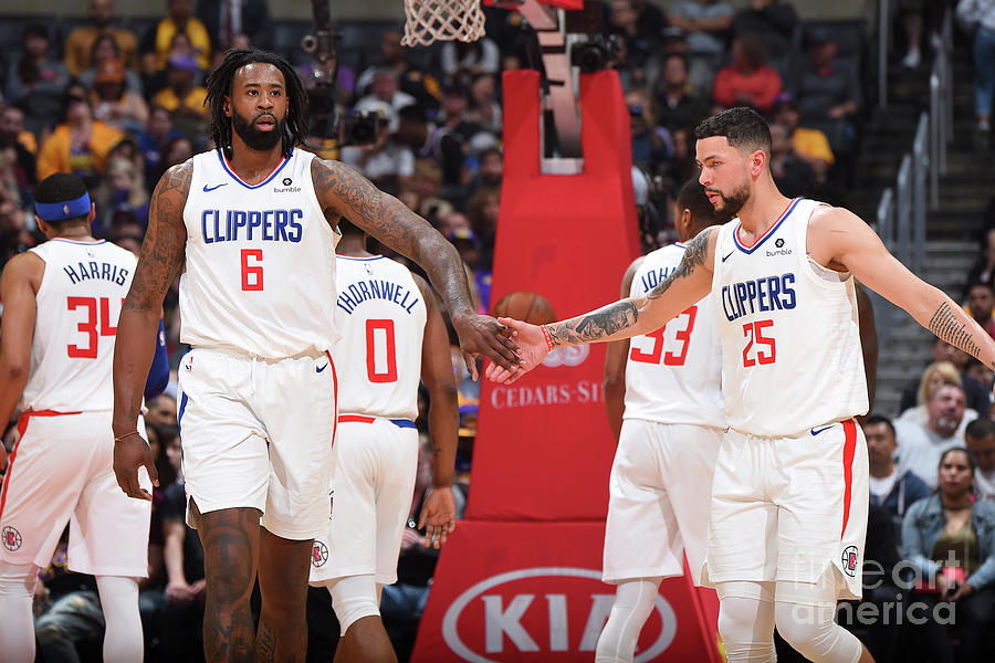 Deandre Jordan and Austin Rivers Photograph by Adam Pantozzi Deandre Jordan and Austin Rivers Photograph by Adam Pantozzi