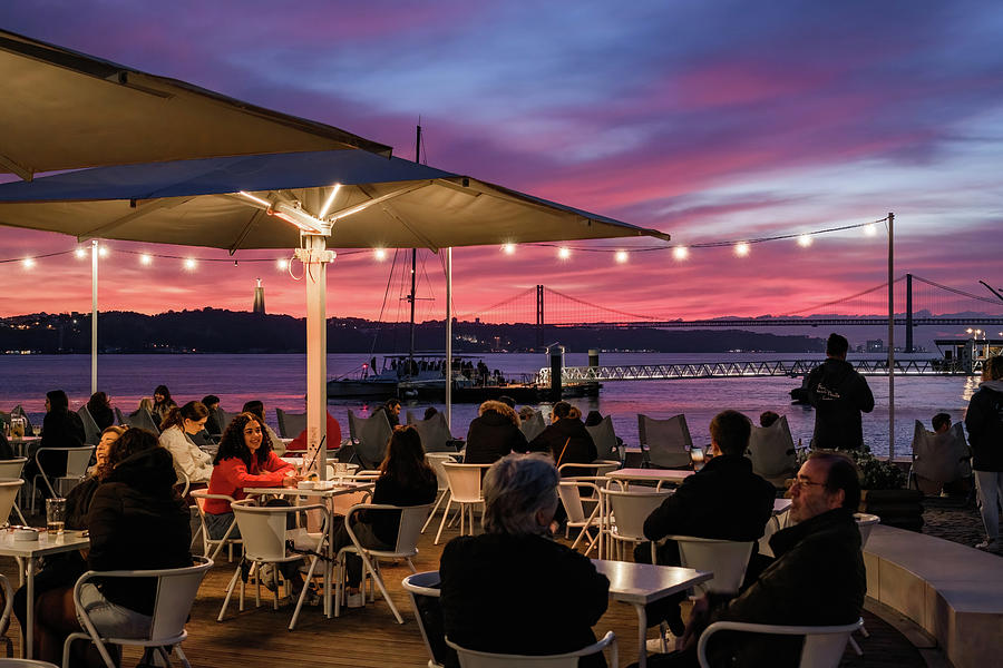 Sunset Photograph - Deck Bar by river Tagus by Carlos Caetano