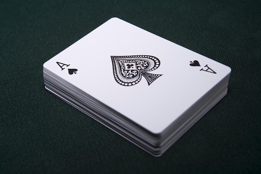 Deck of playing cards with ace on top Photograph by Duncan Nicholls and Simon Webb