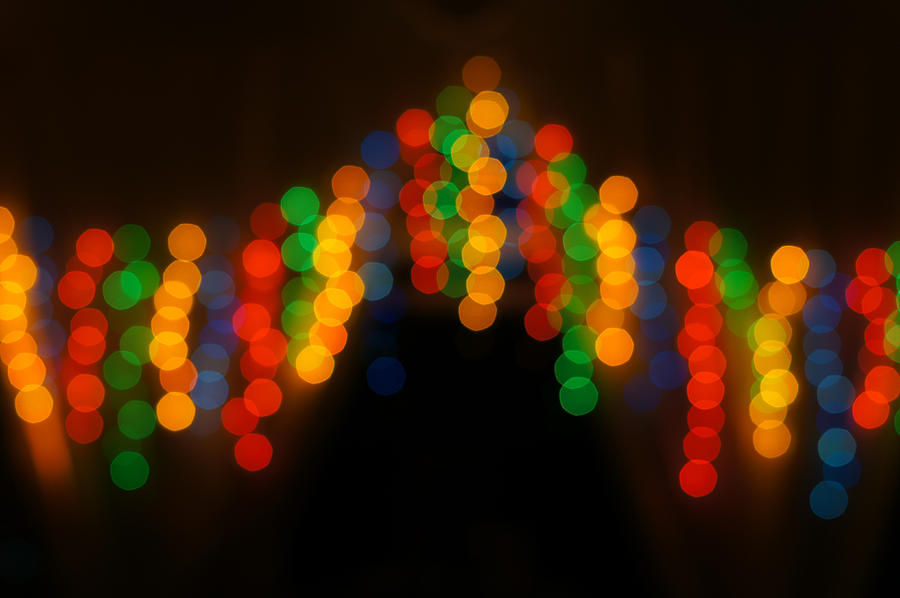 Decoration lamps in blur or bokeh hanging on the door with dark night as background Photograph by Shaifulzamri