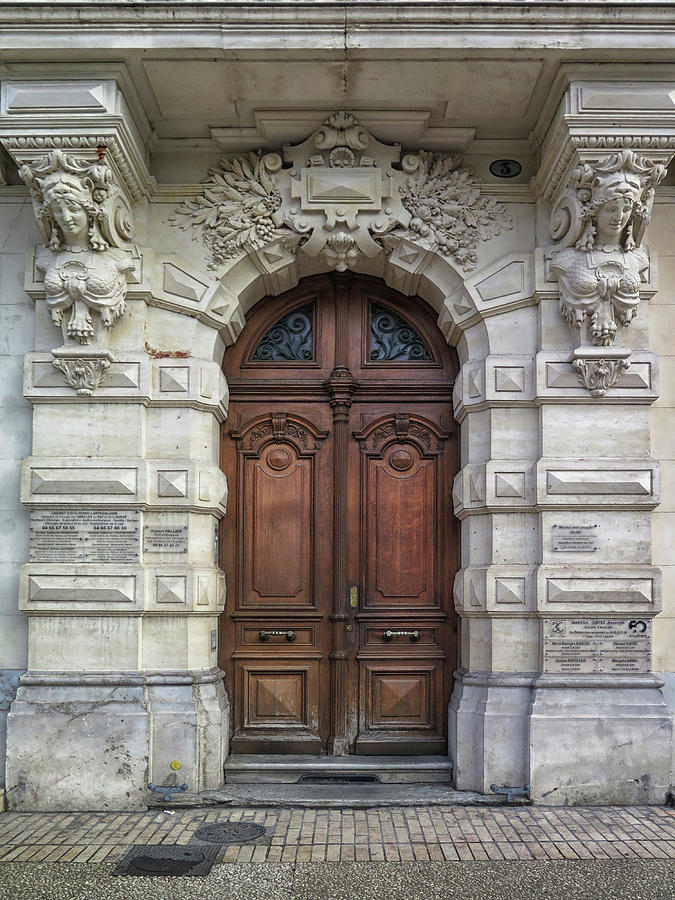Decorative Door In Nimes Photograph by Dave Mills