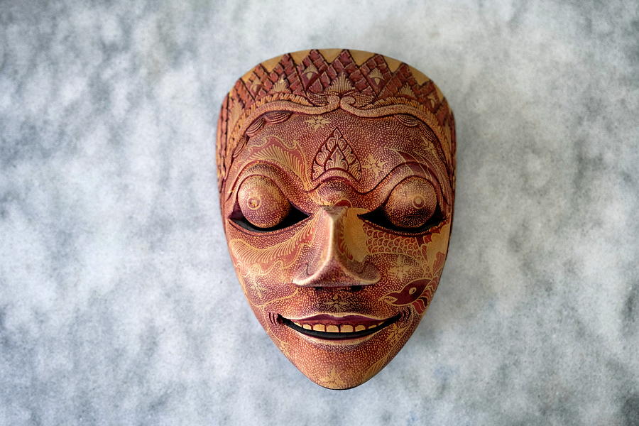 Decorative Wooden Mask From Far East On Gray Marble Tabletop Photograph by Emreturanphoto