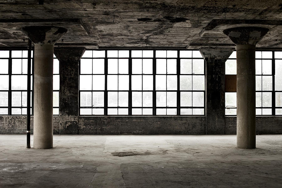 Decrepit industrial loft with columns and windows Photograph by NicolasMcComber