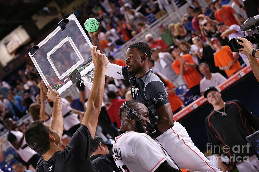 Dee Gordon And Marcell Ozuna Photograph by Rob Foldy Dee Gordon And Marcell Ozuna Photograph by Rob Foldy