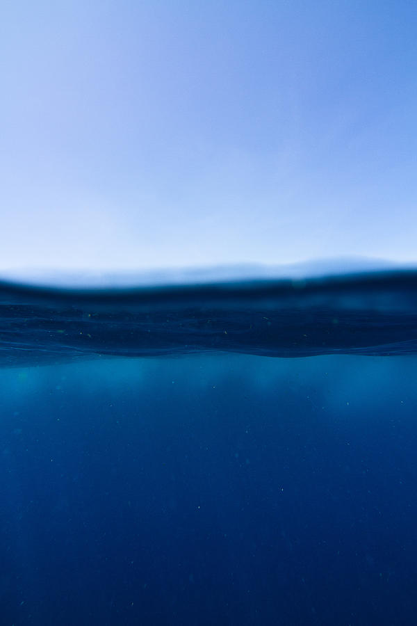Deep Ocean Water Surface Split Photograph by Photo by Joel Sharpe