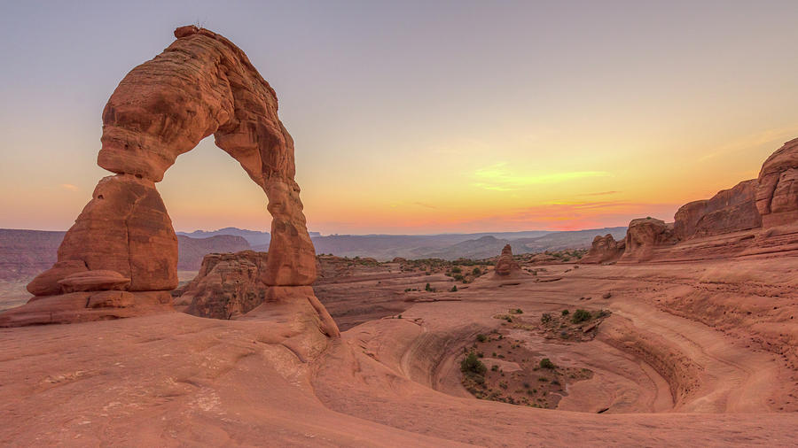 Delicate Arch at Sunset Photograph by Travel Quest Photography