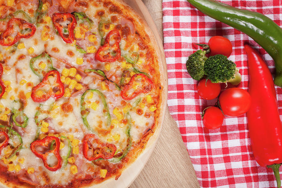 Delicious Italian Pizza With Vegetables And Cheese. Photograph