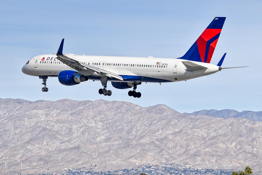 Delta 757 with Mountains Photograph by Jacob Hough - Fine Art America