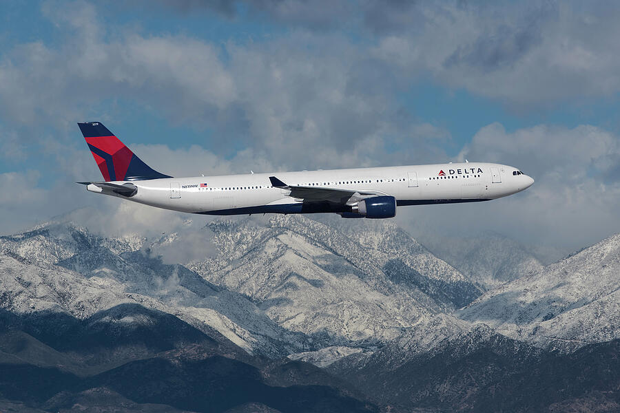 Delta Air Lines A330 Over Snowcapped Mountains Mixed Media by Erik Simonsen