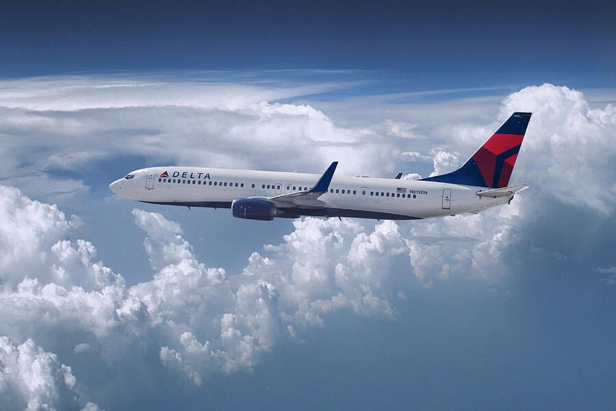 Delta Air Lines Boeing 737 Above the Clouds Mixed Media by Erik Simonsen