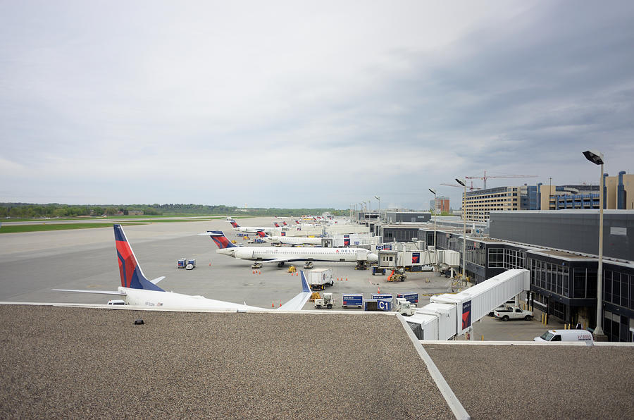 Delta airplanes at Minneapolis-St. Paul International Airport Photograph by Sshepard