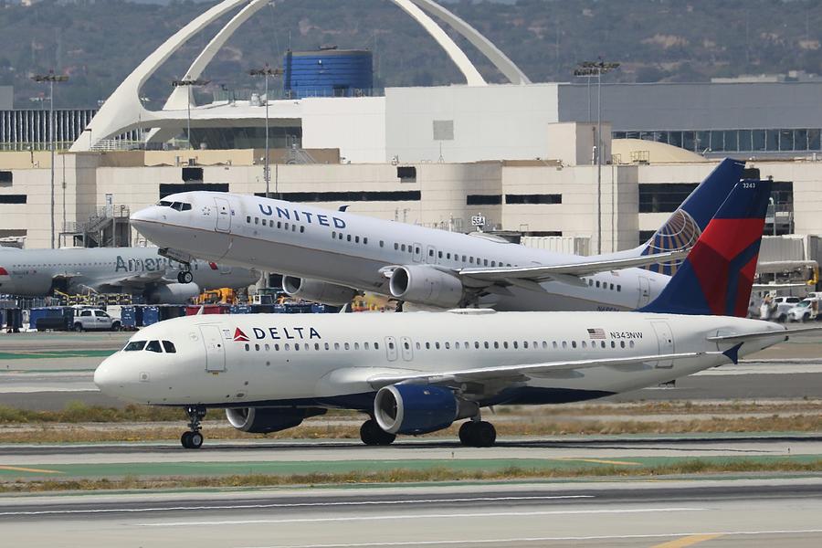 Delta and United Photograph by Robert Lovgren - Fine Art America