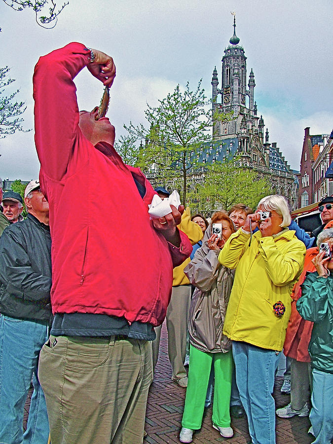 Demo on How to Eat Herring in Middleberg,in Zeeland, Netherlands Photograph by Ruth Hager