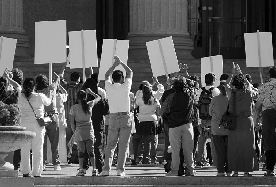Demonstration. Protesting crowd with signs. Photograph by Photosmash