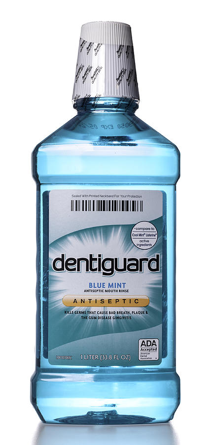 Dentiguard Blue Mint Antiseptic Mouth Rinse bottle Photograph by Jfmdesign