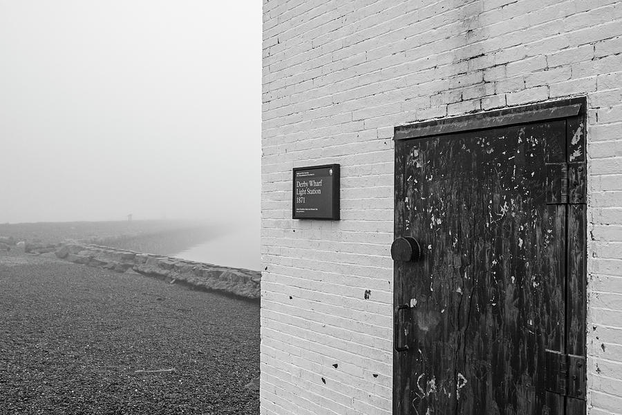Derby Wharf disappearing into the fog from Derby Light Salem Massachusetts Black and White Photograph by Toby McGuire