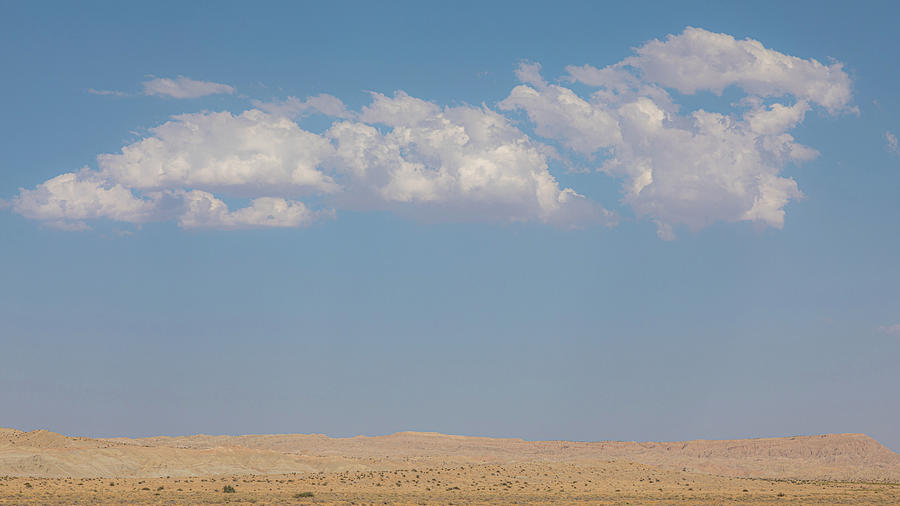 Desert-ed Clouds Photograph