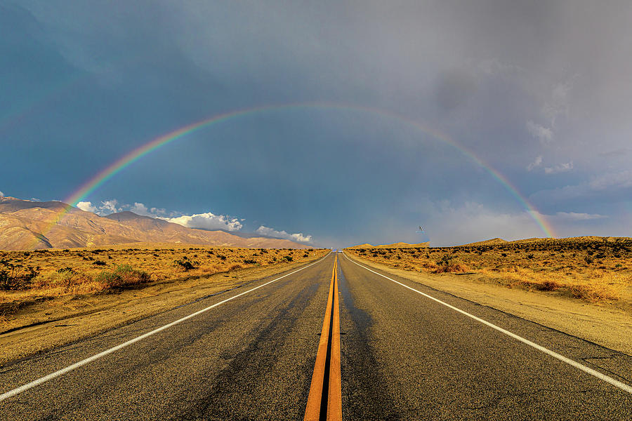 Desert Highway Rainbow Photograph by Peter Tellone