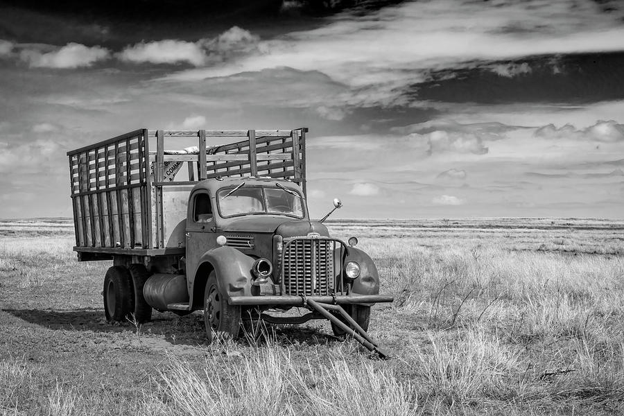 Black And White Photograph - Deserted Harvester Truck by Jurgen Lorenzen