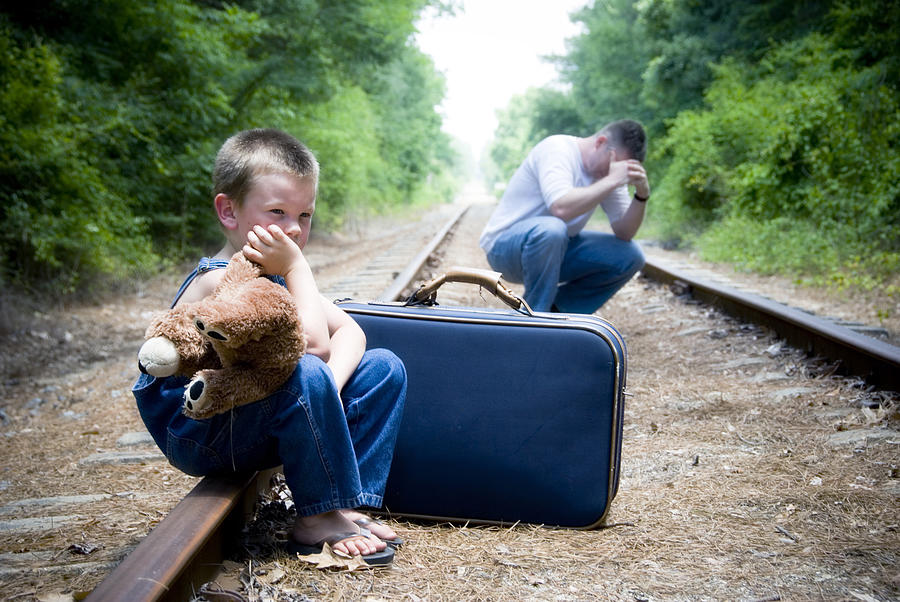 Desperate man and child on train tracks Photograph by Blue_Cutler