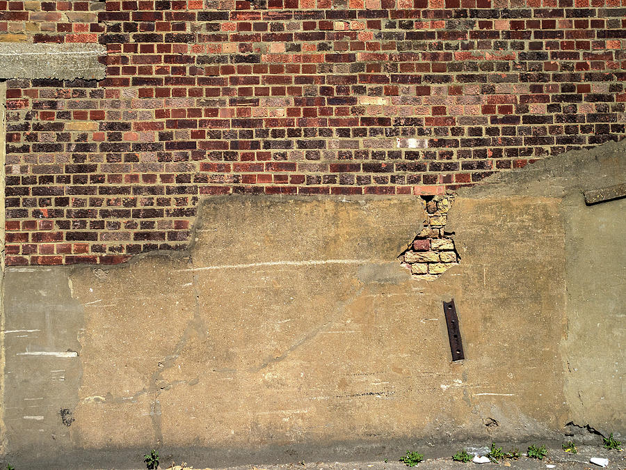 Detail Of An Old Brick Wall With Broken Cement Render Photograph