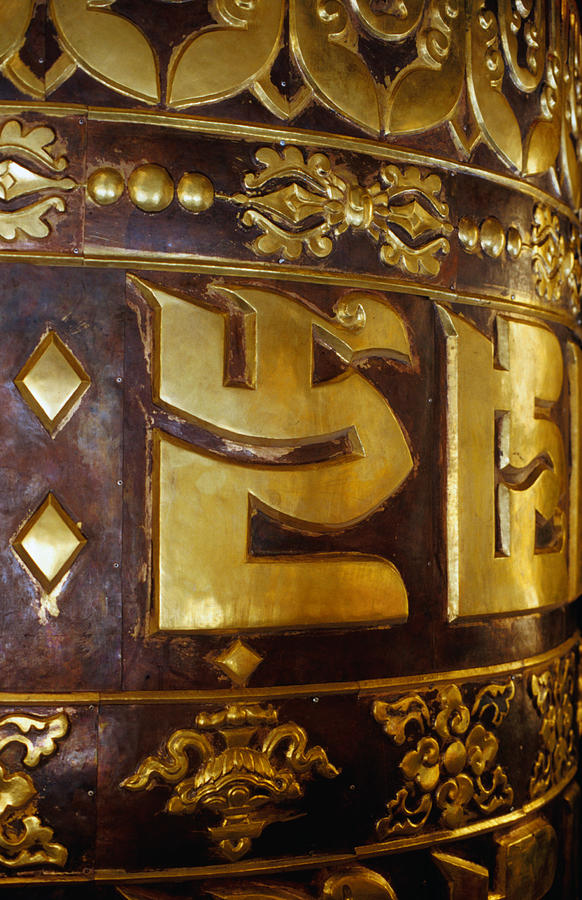 Detail of the large prayer wheel at Kopan Monastery in the Kathmandu Valley. Photograph by Richard IAnson