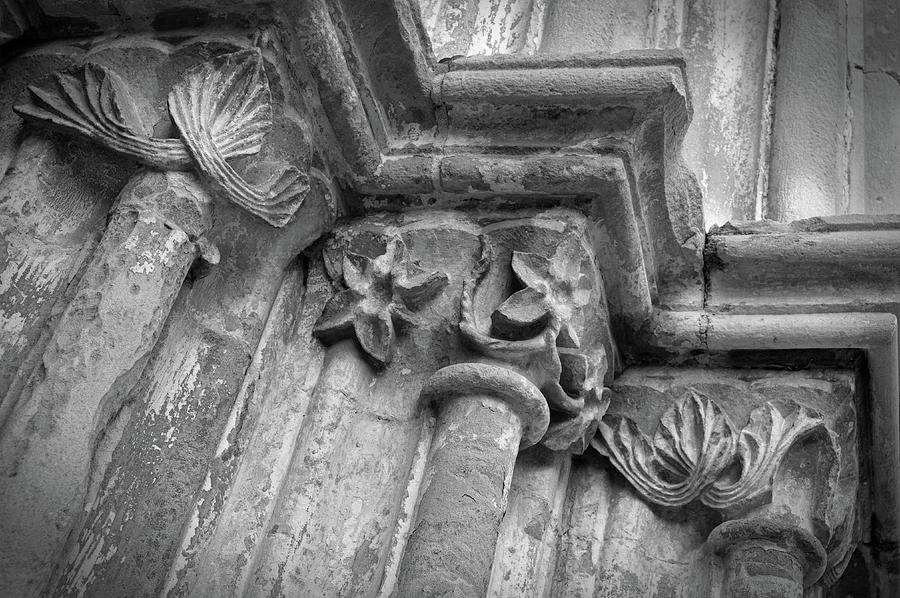 Black And White Photograph - Detail of the medieval portal of Saint Marys church in Tavira. Portugal by Angelo DeVal
