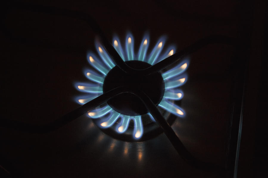 Detail shot of flames on gas burner Photograph by Halfdark