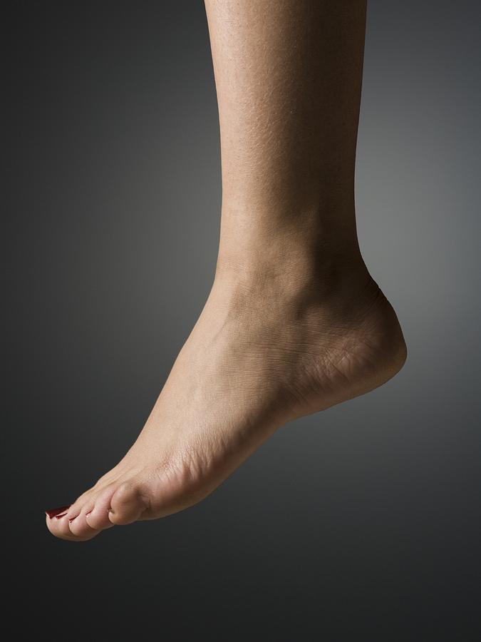 Detailed view of female bare foot and heel profile Photograph by Rubberball/Mark Andersen