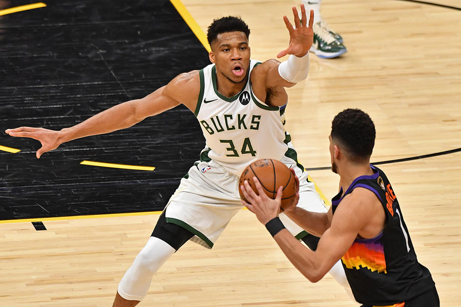 Devin Booker and Giannis Antetokounmpo Photograph by Jesse D. Garrabrant