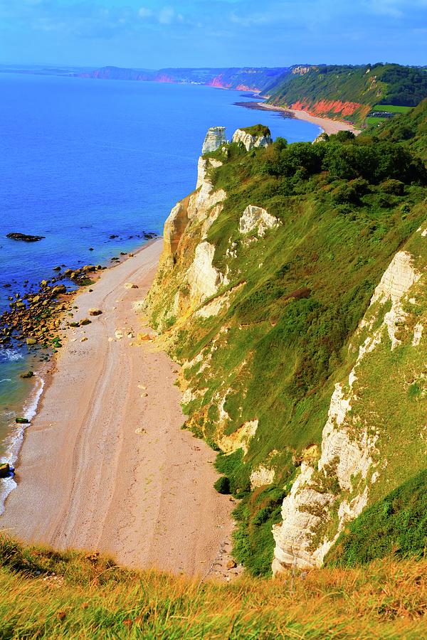 Beach Photograph - Devon coast near Branscombe view towards Sidmouth England UK by Charlesy