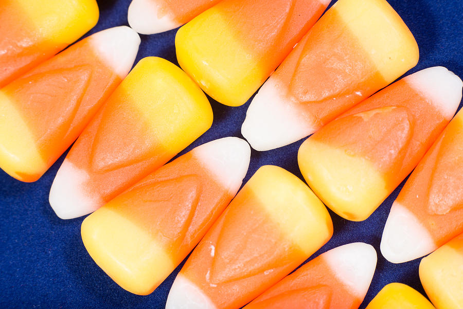 Diagonal line of Candy Corn Photograph by RebeccaBloomPhoto