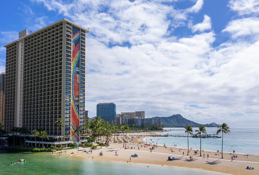 Diamond tower hotel frames the shore in Waikiki Hawaii Photograph by Steven Heap