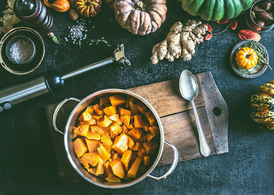 Diced ​​Pumpkin in cooking pot, top view Photograph by Vicuschka
