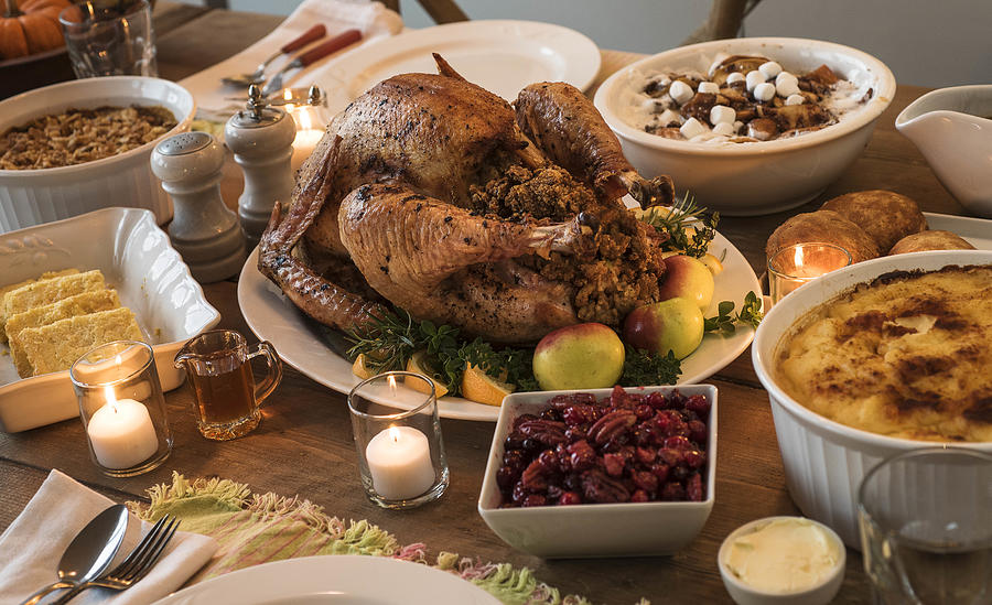 Dining table filled with thanksgiving food Photograph by Tetra Images
