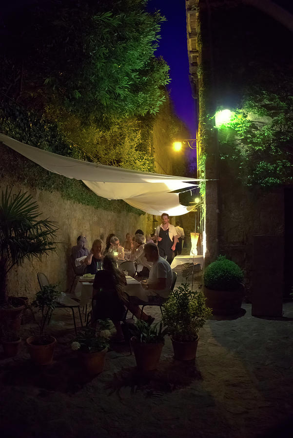 Dinner In Civita Photograph