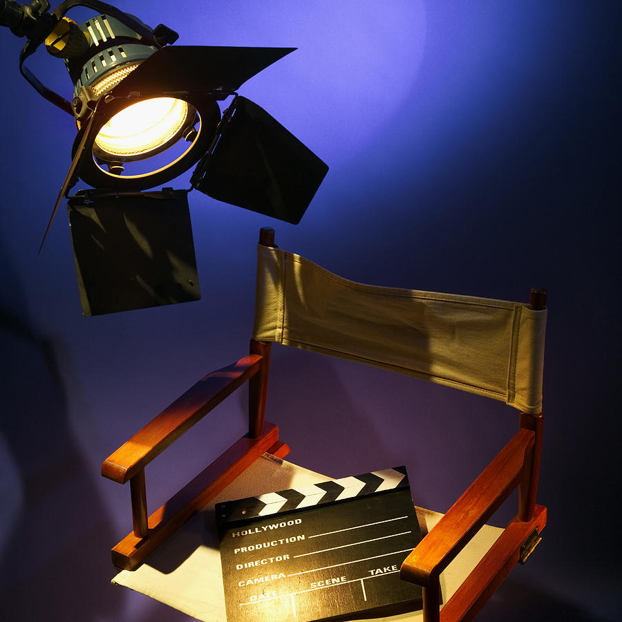 Directors chair and clapperboard and spotlight Photograph by Stockbyte